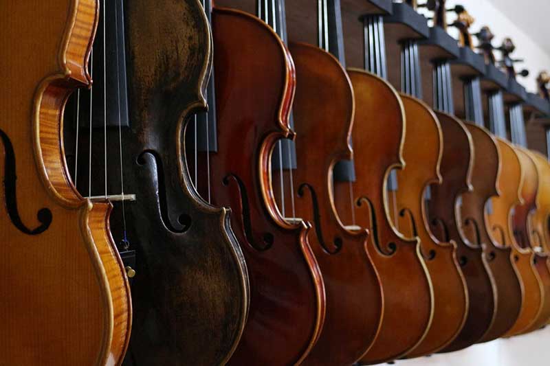 Different size violins side by side