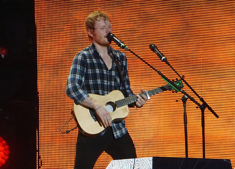 Ed Sheeran Playing a Guitar Song Using a Capo