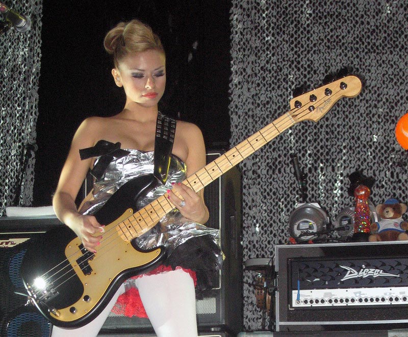 Female Bass Player Ginger Pooley Performing Live