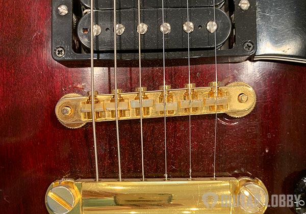 Bridge and Saddles of an Electric Guitar Les Paul Style