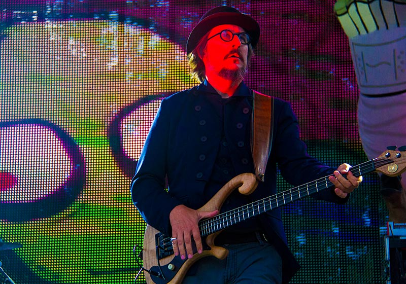 Les Claypool playing bass guitar live