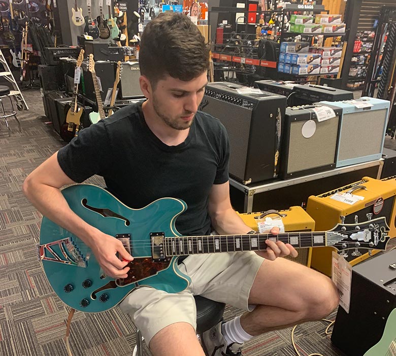 Me playing the D'Angelico Premier DC Semi Hollow guitar